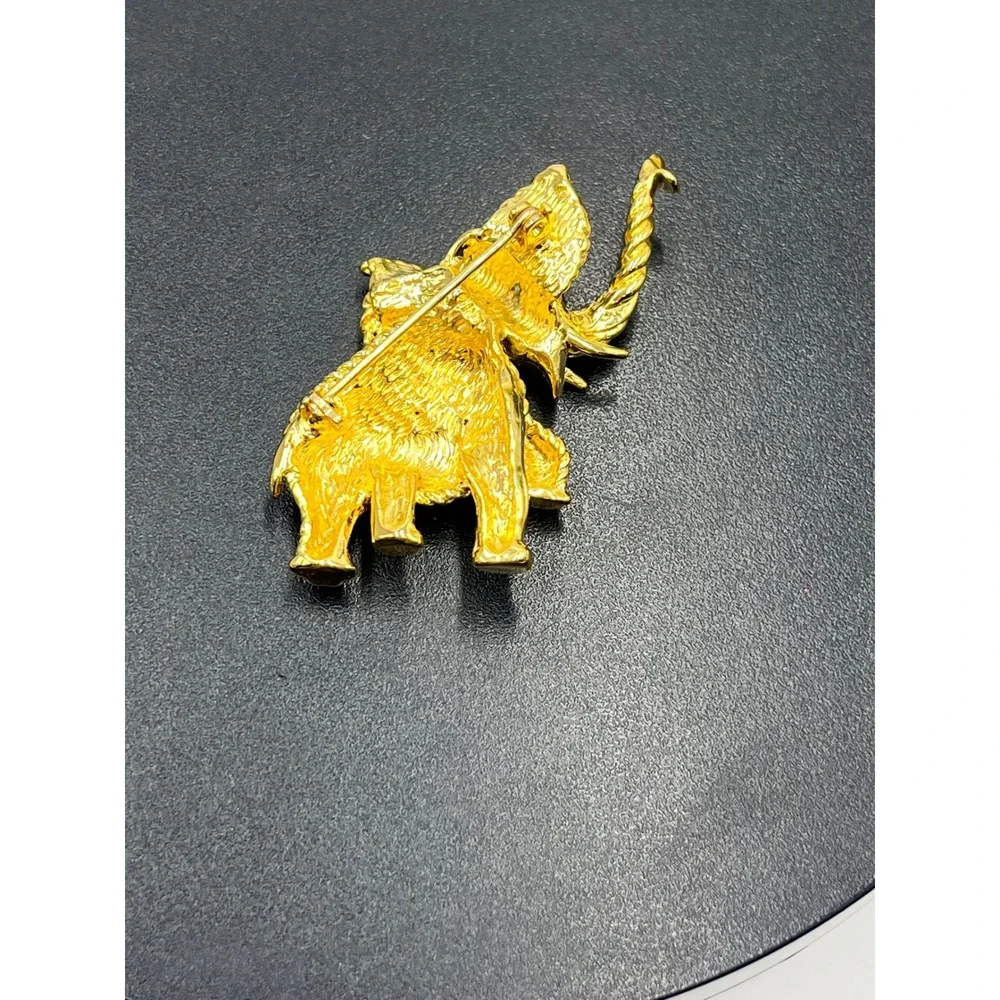 Gold Tone Elephant Pin Brooch Green Rhinestones Eyes Trunk Up Animal Figural Pin